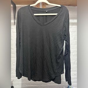Long sleeve v neck black t shirt.